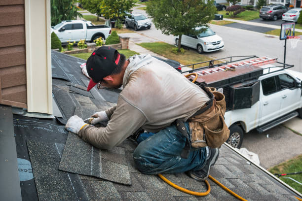 Professional Hail Damage Roof Repair technician working in Saxton, PA